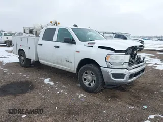 2020 Ram 2500 Tradesman with VIN 3C6UR4HJ1LG261432, listed as a IAAI auction lot 41573636 with 154,147 mi miles. Bid and sale history available at carsss.com. Image 1.