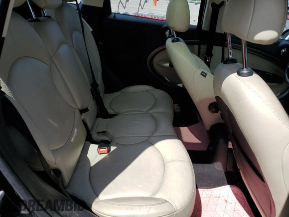 2013 MINI Countryman S ALL4 z VIN WMWZC5C56DWP33270, wystawiony jako Copart lot #56804085 z przebiegiem 141 637 mil mil oraz Szkoda całkowita • Salvage title. Historia ofert i sprzedaży dostępna na DreamBid. Obrazek 10.