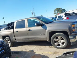2015 Chevrolet Silverado 1500 LT with VIN 3GCPCREC3FG292888, listed as a IAAI auction lot 41416740 with 123,000 mi miles. Bid and sale history available at carsss.com. Image 13.