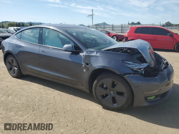 2022 Tesla Model 3 with VIN 5YJ3E1EA4NF244376, listed as a Copart auction lot 52142855 with Not Provided miles and Salvage Title. Bid and sale history available at DreamBid. Image 4.