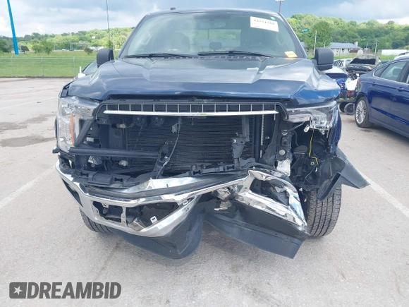 2018 Ford F-150 XL with VIN 1FTFX1E53JFB54183, listed as a IAAI auction lot 42224389 with 62,782 mi miles and . Bid and sale history available at DreamBid. Image 6.