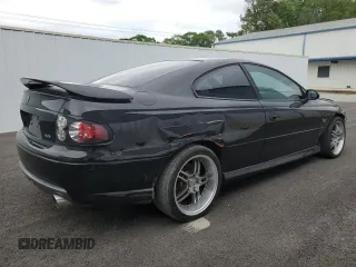 2006 Pontiac GTO with VIN 6G2VX12U06L836591, listed as a Copart auction lot 51596625 with 61,758 mi miles and Salvage Title. Bid and sale history available at carsss.com. Image 3.