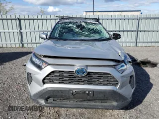 2023 Toyota RAV4 Hybrid XLE Premium with VIN 2T3BWRFV1PW157475, listed as a Copart auction lot 73371224 with 52,412 mi miles and Salvage title. Bid and sale history available at DreamBid. Image 5.
