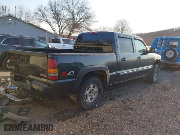 2004 GMC Sierra 1500 SLE z VIN 2GTEK13T041435042, wystawiony jako IAAI lot #41777775 z przebiegiem 218 745 mil mil oraz . Historia ofert i sprzedaży dostępna na DreamBid. Obrazek 4.