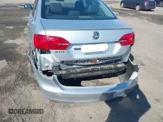 2014 Volkswagen Jetta TDI w/Premium with VIN 3VWLL7AJ2EM359341, listed as a IAAI auction lot 42030959 with 74,273 mi miles and . Bid and sale history available at DreamBid. Image 6.