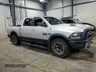 2017 Ram 1500 Rebel with VIN 1C6RR7YT4HS522710, listed as a Copart auction lot 51519335 with 208,742 mi miles and Salvage title. Bid and sale history available at DreamBid. Image 4.