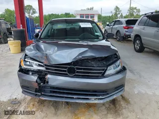 2015 Volkswagen Jetta Sedan 2.0L S w/Technology with VIN 3VW2K7AJ6FM402420, listed as a IAAI auction lot 41996144 with 120,855 mi miles. Bid and sale history available at carsss.com. Image 13.