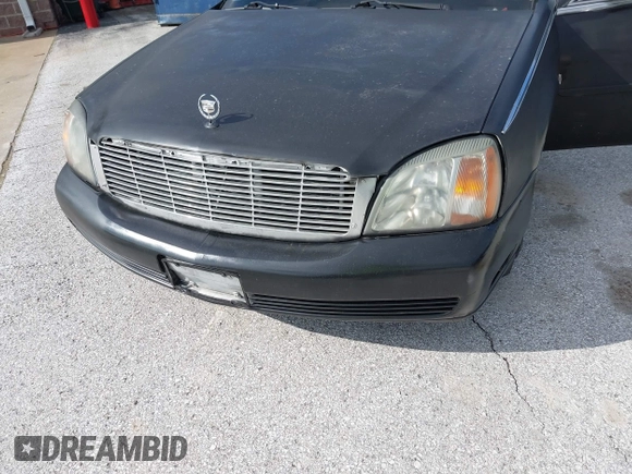 2002 Cadillac DeVille DHS z VIN 1G6KE57Y62U233642, wystawiony jako IAAI lot #42132517 z przebiegiem 223 505 mil mil oraz . Historia ofert i sprzedaży dostępna na DreamBid. Obrazek 6.