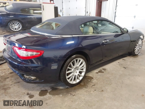 2015 Maserati GranTurismo Convertible Sport with VIN ZAM45MMA5F0141129, listed as a IAAI auction lot 41538585 with 11,267 mi miles. Bid and sale history available at carsss.com. Image 4.