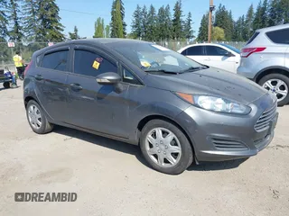 2015 Ford Fiesta SE with VIN 3FADP4EE1FM195949, listed as a IAAI auction lot 42122089 with Not Provided miles. Bid and sale history available at carsss.com. Image 1.
