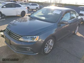 2015 Volkswagen Jetta Sedan 1.8T Sport with VIN 3VWD17AJ2FM318669, listed as a IAAI auction lot 41266868 with 124,539 mi miles. Bid and sale history available at carsss.com. Image 18.