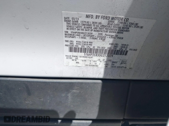 2013 Ford Taurus SEL with VIN 1FAHP2E83DG212029, listed as a IAAI auction lot 42020548 with 172,887 mi miles. Bid and sale history available at carsss.com. Image 9.