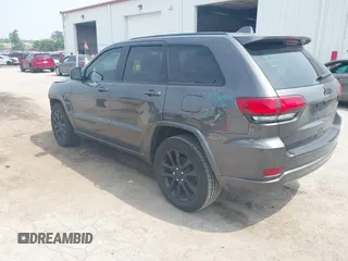 2018 Jeep Grand Cherokee Laredo E with VIN 1C4RJFAG7JC294905, listed as a IAAI auction lot 42452977 with 75,916 mi miles and . Bid and sale history available at DreamBid. Image 3.