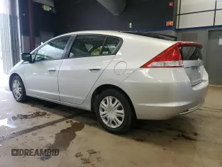 2010 Honda Insight LX z VIN JHMZE2H5XAS018546, wystawiony jako Copart lot #61411545 z przebiegiem 55 814 mil mil oraz Czysty tytuł • Clean title. Historia ofert i sprzedaży dostępna na DreamBid. Obrazek 2.
