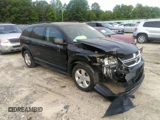 2013 Dodge Journey American Value with VIN 3C4PDCAB8DT577856, listed as a IAAI auction lot 33328787 with 132,876 mi miles and . Bid and sale history available at DreamBid. Image 1.