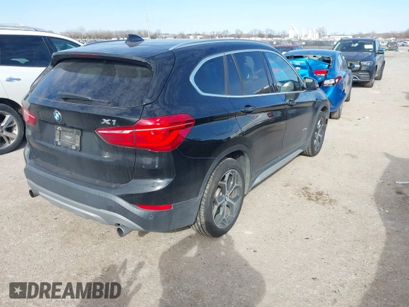 2016 BMW X1 xDrive28i with VIN WBXHT3Z3XG4A48557, listed as a IAAI auction lot 41387960 with 84,821 mi miles. Bid and sale history available at carsss.com. Image 4.