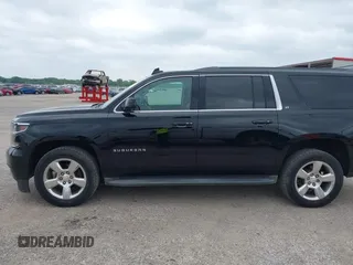 2016 Chevrolet Suburban LT with VIN 1GNSKHKC4GR233059, listed as a IAAI auction lot 42137869 with 115,571 mi miles. Bid and sale history available at carsss.com. Image 14.
