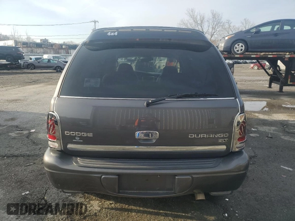 2003 Dodge Durango SLT Plus z VIN 1D4HS58N53F574219, wystawiony jako Copart lot #85208644 z przebiegiem 118 181 mil mil oraz Szkoda całkowita • Salvage title. Historia ofert i sprzedaży dostępna na DreamBid. Obrazek 6.