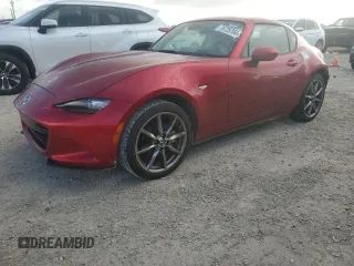 2021 Mazda MX-5 Miata Grand Touring z VIN JM1NDAM74M0457410, wystawiony jako Copart lot #76725704 z przebiegiem 11 151 mil mil oraz Szkoda całkowita • Salvage title. Historia ofert i sprzedaży dostępna na DreamBid. Obrazek 1.