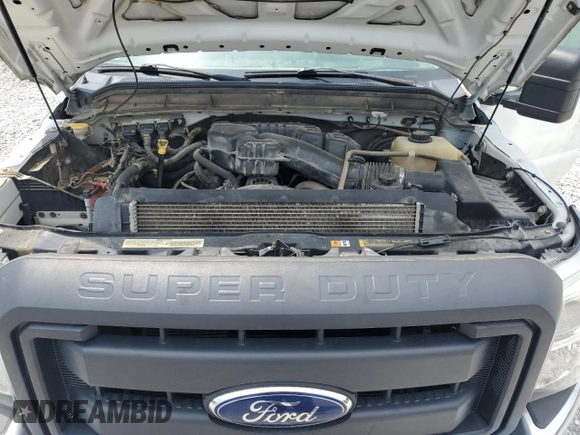 2014 Ford F-250 XL z VIN 1FT7W2A66EEA42226, wystawiony jako Copart lot #59232745 z przebiegiem 115 720 mil mil oraz Szkoda całkowita • Salvage title. Historia ofert i sprzedaży dostępna na DreamBid. Obrazek 11.