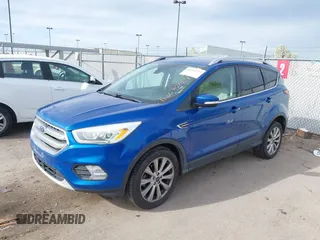 2017 Ford Escape Titanium with VIN 1FMCU0JD1HUA30076, listed as a IAAI auction lot 42024777 with 110,467 mi miles. Bid and sale history available at carsss.com. Image 2.