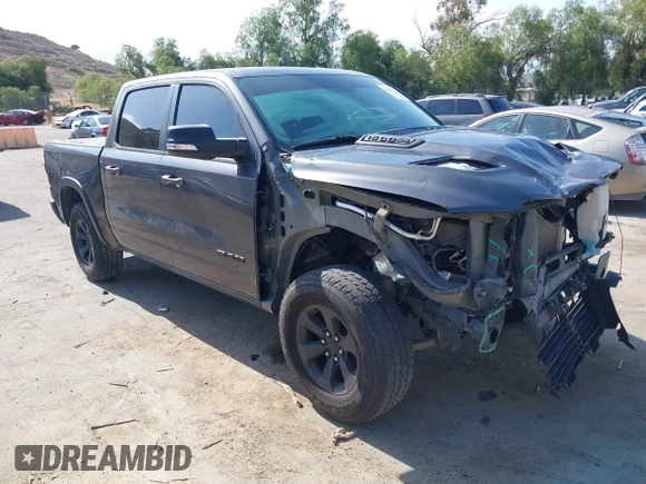 2019 Ram 1500 Rebel z VIN 1C6SRFLT2KN696557, wystawiony jako IAAI lot #42110931 z przebiegiem 81 372 mil mil oraz . Historia ofert i sprzedaży dostępna na DreamBid. Obrazek 1.