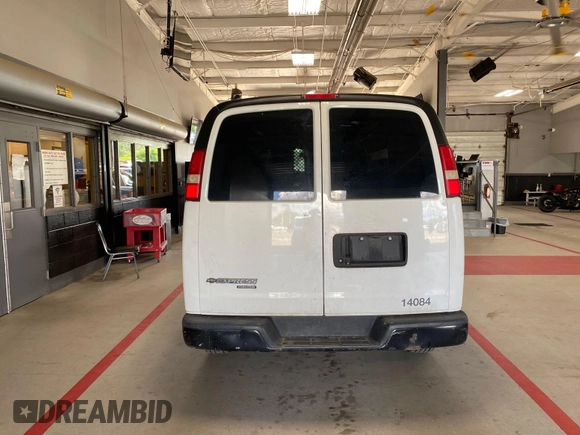 2014 Chevrolet Express Cargo with VIN 1GCWGFCA2E1184095, listed as a IAAI auction lot 42725036 with 270,636 mi miles and . Bid and sale history available at DreamBid. Image 33.