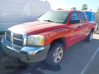 2005 Dodge Dakota SLT z VIN 1D7HE48K85S297456, wystawiony jako IAAI lot #41813718 z przebiegiem 192 229 mil mil oraz . Historia ofert i sprzedaży dostępna na DreamBid. Obrazek 2.