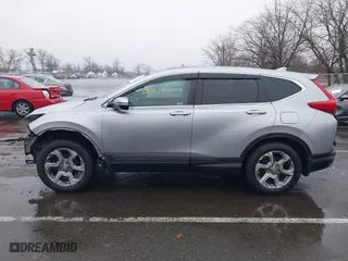 2018 Honda CR-V EX-L with VIN 7FARW2H88JE051829, listed as a IAAI auction lot 41517779 with 69,857 mi miles. Bid and sale history available at carsss.com. Image 14.