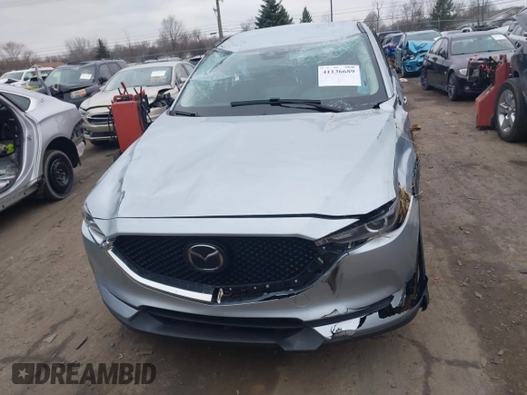 2021 Mazda CX-5 Touring with VIN JM3KFBCM7M0356685, listed as a IAAI auction lot 41136689 with 45,224 mi miles. Bid and sale history available at carsss.com. Image 12.