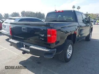 2018 Chevrolet Silverado 1500 Work Truck with VIN 3GCUKNEC6JG463656, listed as a IAAI auction lot 41621657 with 151,580 mi miles. Bid and sale history available at carsss.com. Image 4.