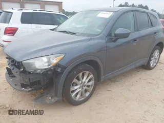 2013 Mazda CX-5 Grand Touring with VIN JM3KE4DE2D0164225, listed as a IAAI auction lot 41663412 with 162,738 mi miles. Bid and sale history available at carsss.com. Image 17.