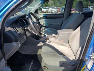 2011 Toyota Tacoma with VIN 3TMLU4EN6BM077873, listed as a Copart auction lot 60062065 with 228,245 mi miles and Salvage title. Bid and sale history available at DreamBid. Image 7.