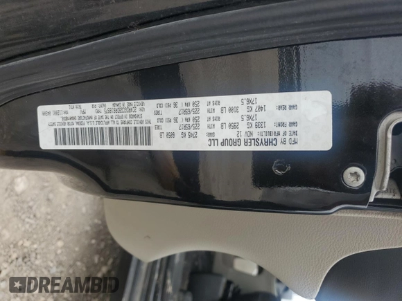 2013 Dodge Grand Caravan SXT with VIN 2C4RDGCG9DR618975, listed as a Copart auction lot 51378005 with 145,373 mi miles and Salvage Title. Bid and sale history available at DreamBid. Image 16.