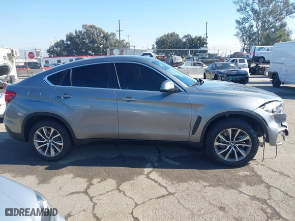 2015 BMW X6 xDrive50i with VIN 5UXKU6C52F0F94060, listed as a IAAI auction lot 41299202 with 67,835 mi miles. Bid and sale history available at carsss.com. Image 13.