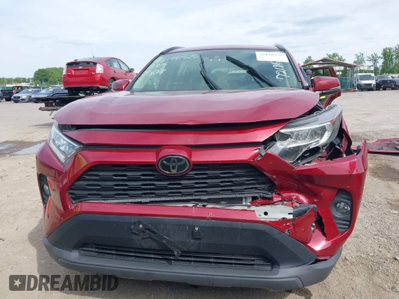 2019 Toyota RAV4 XLE with VIN JTMP1RFV2KD021348, listed as a IAAI auction lot 42198925 with 130,838 mi miles and . Bid and sale history available at DreamBid. Image 12.
