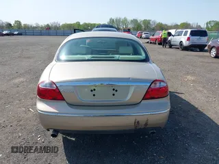 2005 Jaguar S-Type with VIN SAJWA01T95FN22745, listed as a IAAI auction lot 41898269 with 57,614 mi miles and . Bid and sale history available at DreamBid. Image 16.