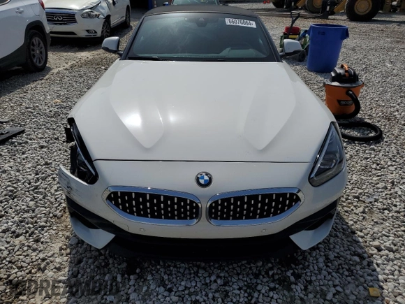 2020 BMW Z4 sDrive30i with VIN WBAHF3C06LWW83982, listed as a Copart auction lot 66076064 with 71,855 mi miles and Salvage Title. Bid and sale history available at carsss.com. Image 5.