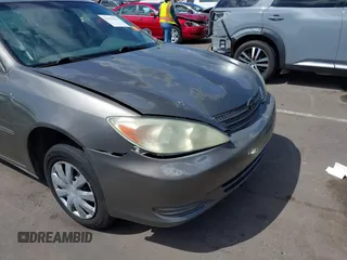 2004 Toyota Camry LE with VIN 4T1BE32K44U825561, listed as a IAAI auction lot 42051914 with 244,521 mi miles and . Bid and sale history available at DreamBid. Image 16.
