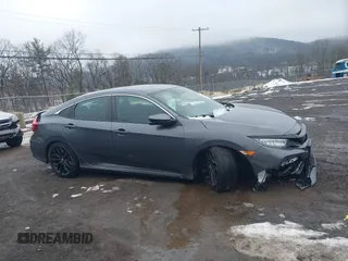 2020 Honda Civic Si with VIN 2HGFC1E55LH707320, listed as a IAAI auction lot 41569008 with 65,441 mi miles and . Bid and sale history available at DreamBid. Image 13.