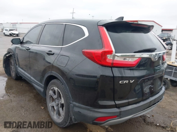 2017 Honda CR-V EX with VIN 7FARW1H59HE007171, listed as a IAAI auction lot 42033941 with 134,227 mi miles and . Bid and sale history available at DreamBid. Image 3.