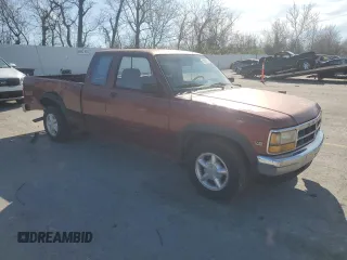 1992 Dodge Dakota z VIN 1B7GL23YXNS633409, wystawiony jako Copart lot #51067775 z przebiegiem 153 174 mil mil oraz Szkoda całkowita • Salvage title. Historia ofert i sprzedaży dostępna na DreamBid. Obrazek 4.