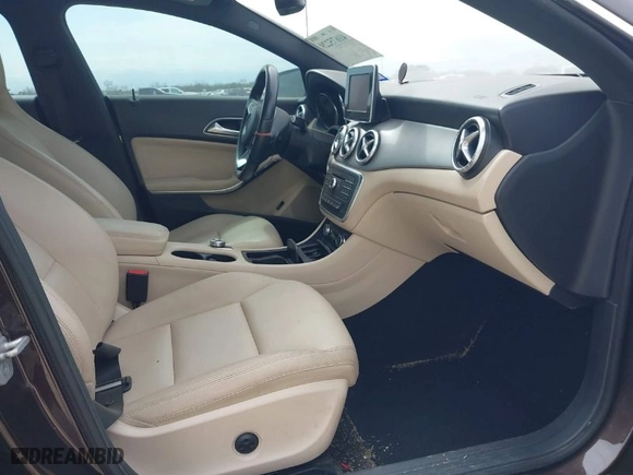 2015 Mercedes-Benz CLA-Class CLA 250 with VIN WDDSJ4EBXFN185179, listed as a IAAI auction lot 41675229 with 104,131 mi miles. Bid and sale history available at carsss.com. Image 5.