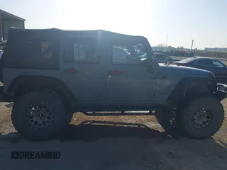 2015 Jeep Wrangler Unlimited Sport с VIN 1C4BJWDG6FL774275, выставлен на аукционе IAAI как лот 41984611 с пробегом 113 726 миль миль и . История ставок и продаж доступна на DreamBid. Изображение 13.