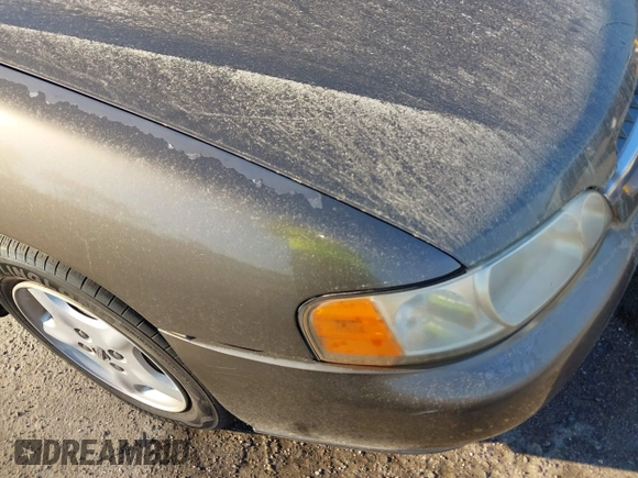 2000 Nissan Altima XE with VIN 1N4DL01D8YC235627, listed as a IAAI auction lot 41662564 with 79,409 mi miles and . Bid and sale history available at DreamBid. Image 6.