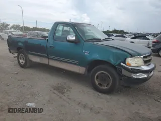 1998 Ford F-150 XL with VIN 1FTRF17L0WNA48153, listed as a Copart auction lot 72606904 with 213,592 mi miles and Non repairable. Bid and sale history available at DreamBid. Image 4.
