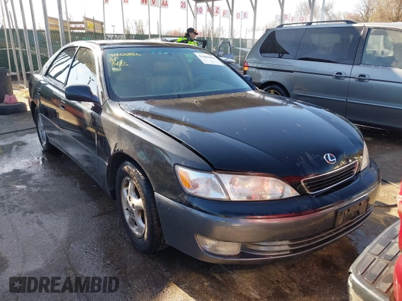1997 Lexus ES 300 Luxury Sport Sdn with VIN JT8BF22GXV5003056, listed as a IAAI auction lot 41806886 with 130,063 mi miles. Bid and sale history available at carsss.com. Image 12.