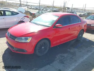 2014 Volkswagen Jetta Sedan SE w/Connectivity with VIN 3VWB07AJ1EM442408, listed as a IAAI auction lot 41748093 with NaN miles. Bid and sale history available at carsss.com. Image 2.
