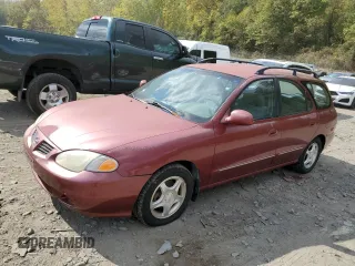 1999 Hyundai Elantra z VIN KMHJW35F0XU129498, wystawiony jako Copart lot #74481134 z przebiegiem 72 123 mil mil oraz Czysty tytuł • Clean title. Historia ofert i sprzedaży dostępna na DreamBid. Obrazek 1.