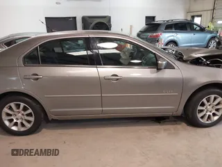 2008 Mercury Milan z VIN 3MEHM01108R641433, wystawiony jako IAAI lot #41504196 z przebiegiem 223 422 mil mil oraz . Historia ofert i sprzedaży dostępna na DreamBid. Obrazek 13.